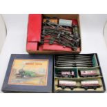 One tray containing a quantity of various 0 gauge locomotives, rolling stock and lineside