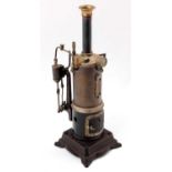 Doll et Cie, single cylinder vertical steam engine, fittings to include sight glass, weighted safety