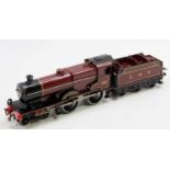 A Hornby Railways repainted clockwork LMS 4-4-0 locomotive and tender finished in maroon and lined