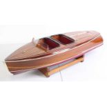 A scratch-built Chris Craft barrel back mahogany planked boat, fitted with an electric motor, ESC