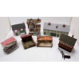 Two large trays containing seven beautifully made Gauge 1 buildings: Village Music Store; house; row