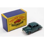 Matchbox Lesney No. 46 Morris Minor 1000 with a green body, metal wheels and silver trim in its