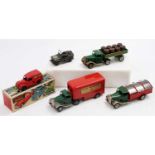 A collection of five boxed and loose Triang Minic tinplate and plastic bodied commercial vehicles to