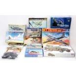 One box of mixed scale plastic military kits by Italeri, Tamiya, Airfix and others, specific