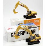 A Rega 1/40 scale Caterpillar tracked excavator boxed diecast group, two examples to include a