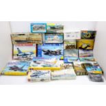 Two boxes of mixed scale military plastic kits to include Heller, Revell, Frog and others, to