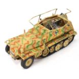 A large tinplate and pressed steel model of a German SD KFZ 250/3 Tank, very heavy model with