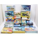 Two boxes of mixed scale plastic military aircraft kits to include an Italeri Novokits Airfix and
