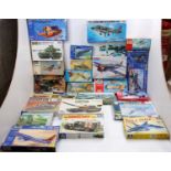 Two boxes of mixed scale plastic military kits to include Hales, Frog, Tamiya, Lindberg and