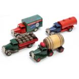 A collection of four various Triang Minic tinplate and clockwork vehicles to include a Carter