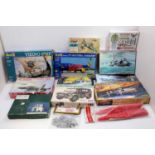 One tray containing a collection of various plastic military kits to include Tran Kits, Heller,