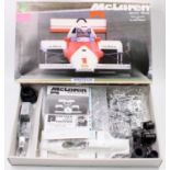 A Protar plastic and white metal model kit for a No. 208M Mclaren MP4/2C 1/12 scale Formula One race