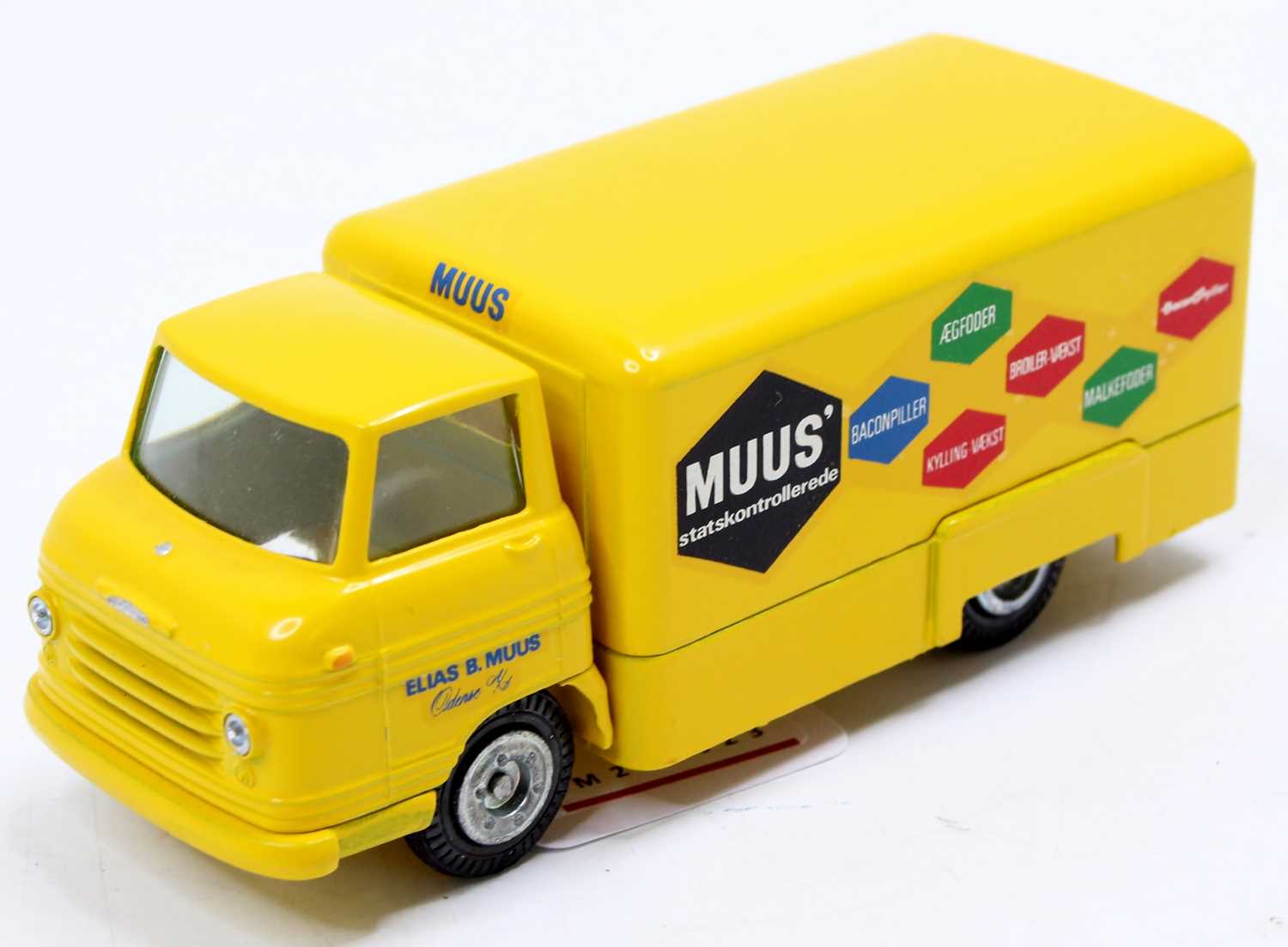 Tekno No. 457 Volvo Express Van comprising a yellow body, cast hubs, clear windows, with 'MUUS'