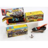 A Corgi Toys Batmobile and Batboat boxed group to include a No. 267 Batmobile, housed in the