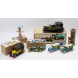 A collection of mixed tinplate models including 2 boxed Paya of Spain veteran cars - a Taxi, and a