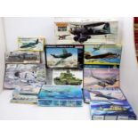 One box of boxed mixed scale plastic military aircraft kits to include Revell, Italeri and