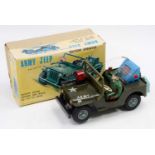 A modern Toys of Japan tinplate and plastic battery operated model of an Army Jeep, complete with