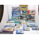 Two boxes of military interest plastic kits to include Airfix, Italeri, Hasegawa and others,