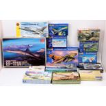 A collection of 14 mixed model kits, with examples including an Academy 1/48th scale General