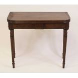 A George III mahogany tea table, the D-shaped fold-over top having a reeded edge and on gateleg rear