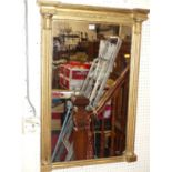 A 19th century gilt wood rectangular pier mirror, having acanthus leaf capped and fluted half