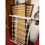 A contemporary painted metal and brass double bedstead, in the Victorian taste, having twin