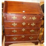 A 19th century mahogany slopefront writing bureau, having four long graduated drawers, w.80cm