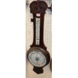 A 1930s aneroid two-dial wheel barometer