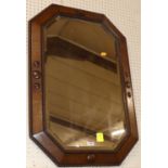 A 1920s beaded oak bevelled wall mirror, 78 x 54cm