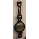 An early 19th century mahogany four dial wheel barometer, the lower scale signed Warranted