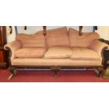 An early 20th century mahogany framed and fabric striped upholstered three-seater scroll-end sofa,