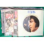 One tray of various Elvis Presley related vinyl LPs and hardback books