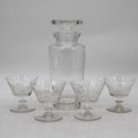 A cut glass decanter, inscribed "N" to the body, together with four matching drinking glasses (5)