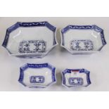 A set of four graduated Chinese blue and white porcelain dishes, of canted rectangular shape, each