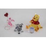Two Swarovski coloured crystal Disney figures, being Winnie the Pooh, and Piglet, together with