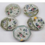 Five Chinese pottery plates, each enamel decorated with flowers