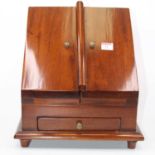 A reproduction hardwood stationery cabinet, having a fitted interior, h. 34cm