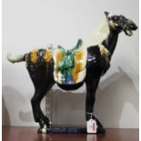 A polychrome glazed Tang style pottery horse, height 47cm
