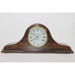 A reproduction mahogany cased Nelson's hat mantel clock, the painted dial with Arabic numerals,
