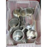 A box of pewter tankards