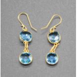 A pair of contemporary 14ct yellow gold and blue topaz ear pendants, on shepherd's crook fittings,