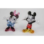 A pair of Swarovski coloured crystal Disney figures, being Mickey and Minnie Mouse, height of Mickey