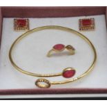 A Pandora silver gilt suite of jewellery, comprising a bangle, ring and pair of ear studs, all in