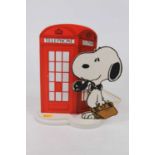 A Nuova Linea Zero table lamp in the form of Snoopy standing in front of a phonebox, height 28cm