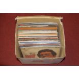 A box of vintage 12" vinyl records, to include Buck Owens & The Buckaroos; Ruby, and George