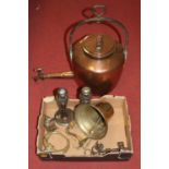 A Victorian copper kettle, having a cast iron handle, the spout fitted with tap; together with other