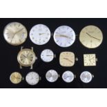 A collection of wristwatch dials/movements to include Garrard, Longines, Omega, Tudor and Favre-