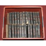 A collection of early 19th century black leather bound titles by Sir Walter Scott (24)