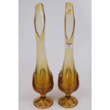 A pair of 20th century amber coloured moulded art glass vases, of tapering half-reeded form,