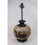 A Chinese pottery table lamp, of bulbous form, decorated with deer, h.52cm (including fittings)